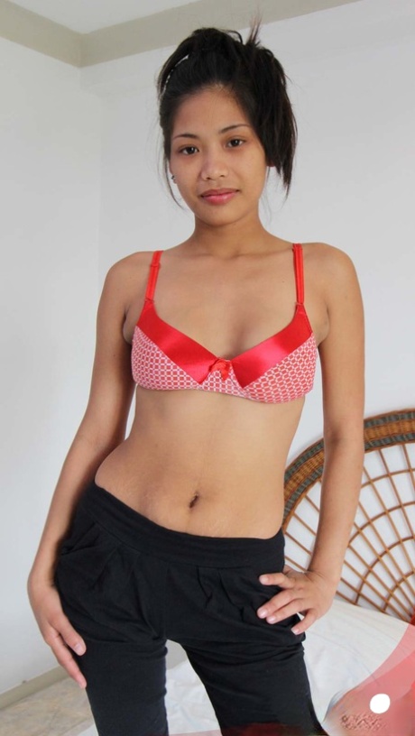 Thin Filipino girl shows off her her bald pussy before jerking a sex tourist - pornpics.de