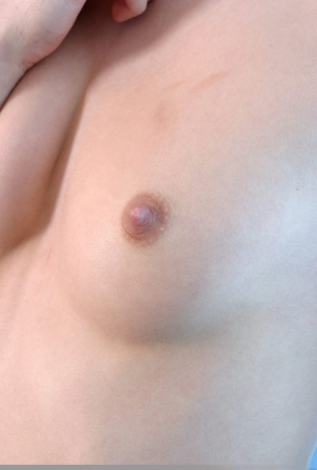 Nice young girl Melisande gets totally naked in a sensual fashion