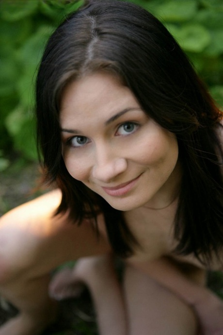 Nice young girl Corrin gets completely naked while in a forest