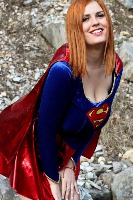 Thick redhead Alexsis Faye releases her giant tits from Superman osutfit - pornpics.de