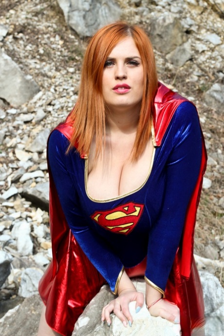 Thick redhead Alexsis Faye releases her giant tits from Superman osutfit - pornpics.de