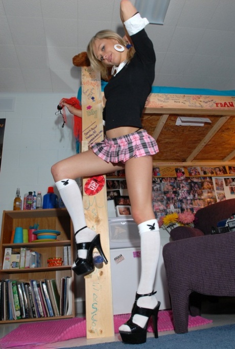Sexy blonde teen Kasia in micro skirt and socks bending over to flash her ass - pornpics.de