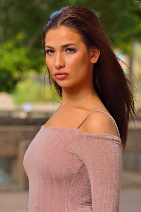Hot teen girl pulls up her dress on park bench and inserts a butt plug in ass
