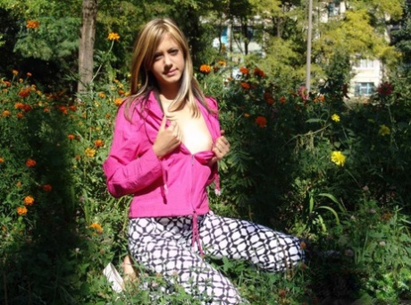 Young blonde flashes her tits and ass while out in public places