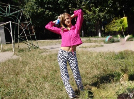 Young blonde flashes her tits and ass while out in public places