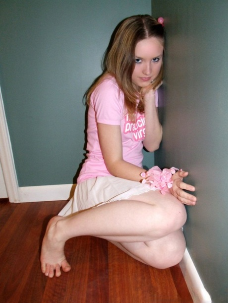 Charming teen Kitty exposes her small tits in a room wearing sexy underwear - pornpics.de