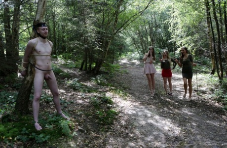 3 young girls walking in the woods find a restrained man and suck his cock - pornpics.de