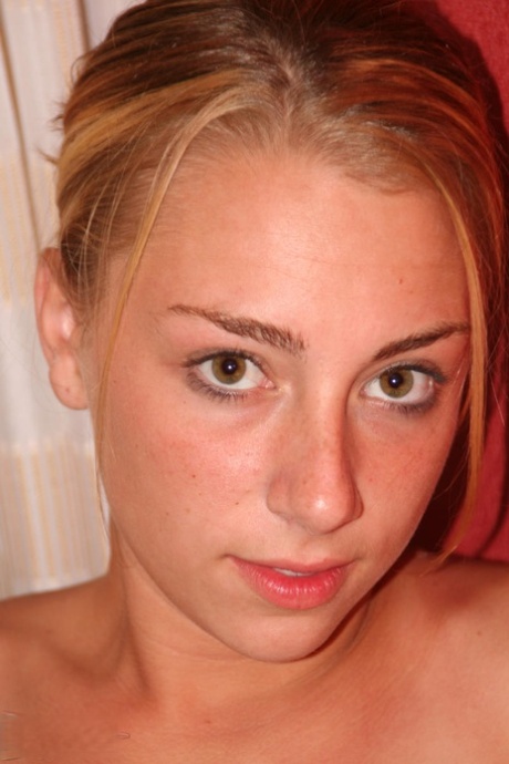 First timer Krista peels off a black bra and thong to get naked by herself