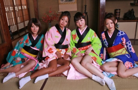 Hot young Japanese models remove their kimonos for raunchy group groping