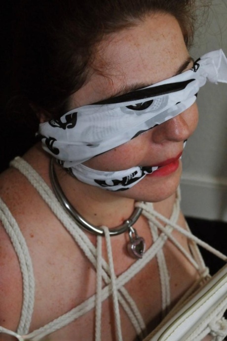 Fat female with red lisp is left gagged and tied up by ropes
