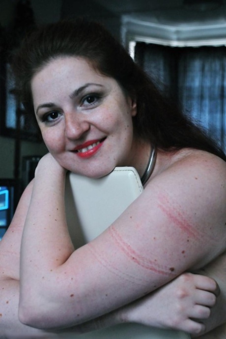 Fat female with red lisp is left gagged and tied up by ropes