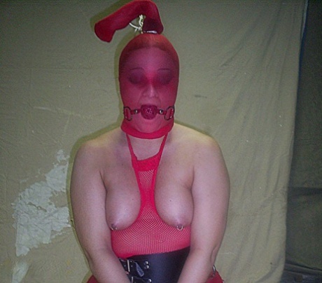 Caucasian plumper is subjected to breath play while topless and restrained