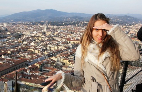 Young looking girl is captured in non nude candid action while on vacation