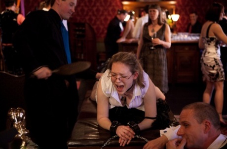 Female slaves provide hardcore entertainment during a dinner party