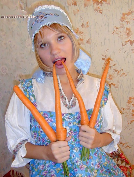 Blonde Russian teen sticks carrots in her asshole with a cuke in her pussy - pornpics.de