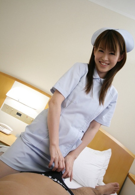 Japanese nurse Himeno has her natural tits fondled after kissing a patient - pornpics.de