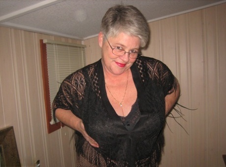 Fat granny unleashes her huge breasts before flashing no panty upskirt