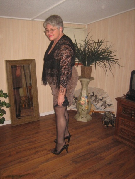 Fat granny unleashes her huge breasts before flashing no panty upskirt
