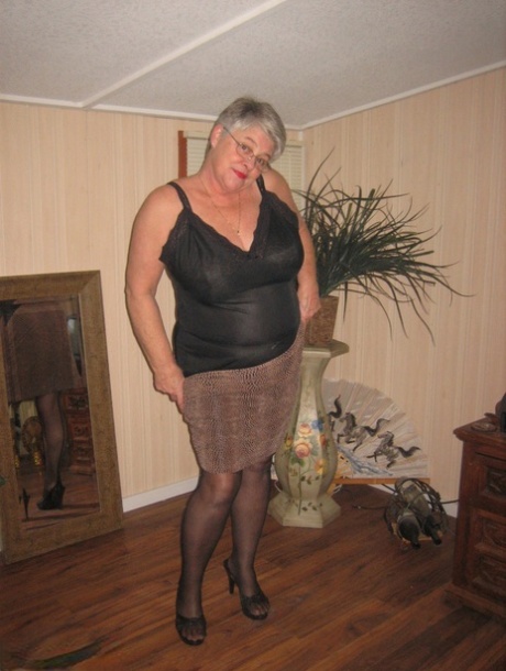 Fat granny unleashes her huge breasts before flashing no panty upskirt