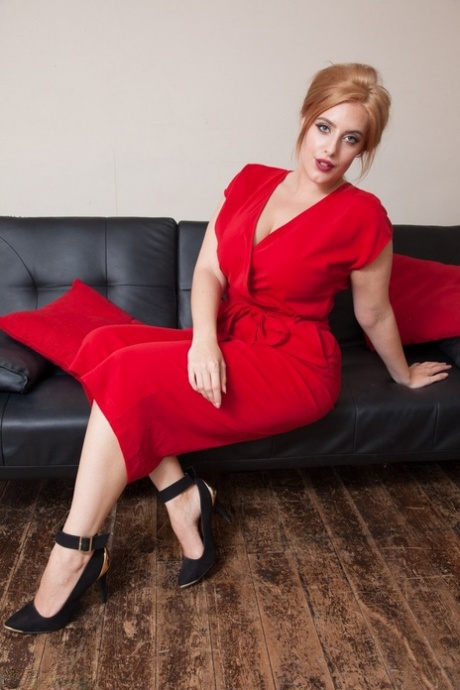Hot redhead Bella looses her breasts after freeing feet from ankle strap heels