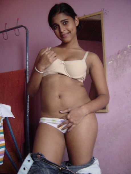 Indian solo girl fondles her large boobs after stripping to her panties