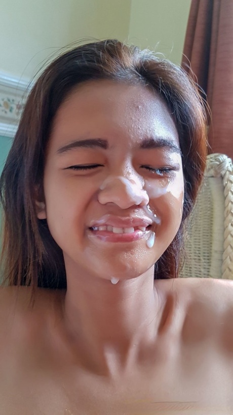 Young Asian girl Lyka takes a facial cumshot after fucking in black stockings - pornpics.de