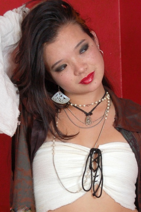 Nice teen Charli sports red lips while working free of pirate clothing