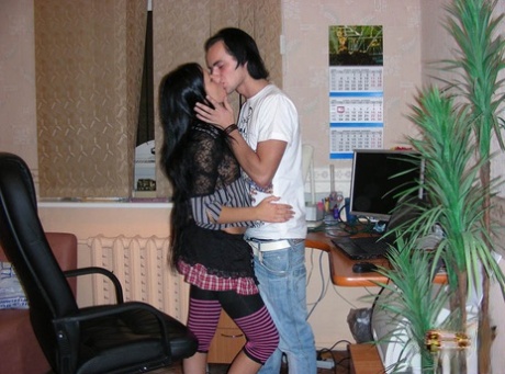 Young brunette and her man friend undress before before office sex - pornpics.de