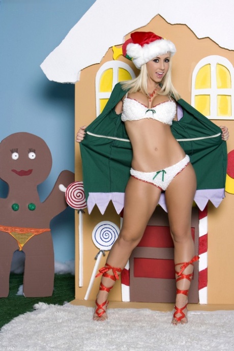 Cute blonde Jessica Lynn poses for a centerfold spread with an Xmas theme
