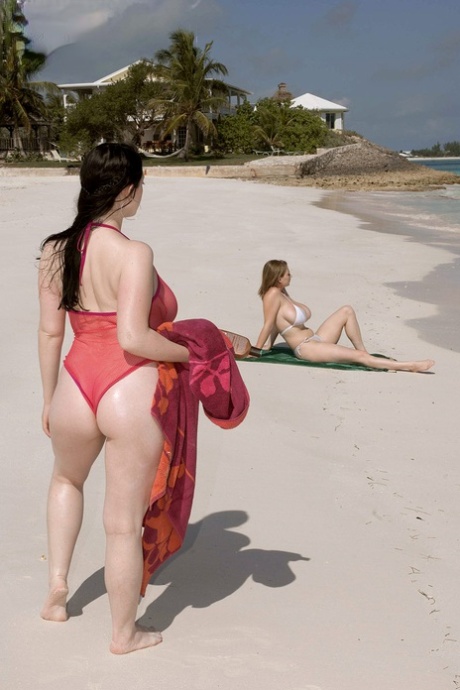 Big boobed lesbian Christy Marks seduces a busty female for sex on the beach - pornpics.de