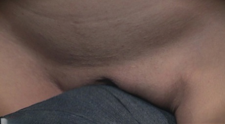 Clothed girl undergoes messy throat fucking while being restrained
