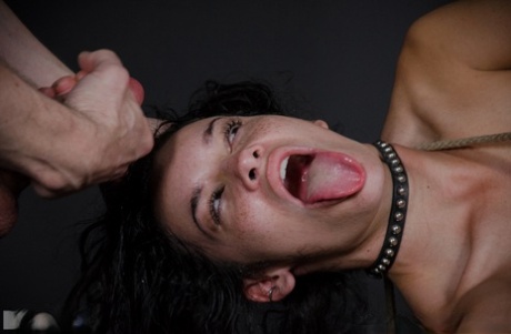 Dark haired chick Eden Sin is used as a cum receptacle during BDSM sessions