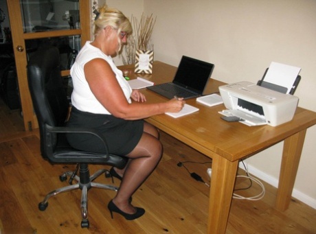 Blonde fatty Chrissy Uk exposes herself while working from her home office