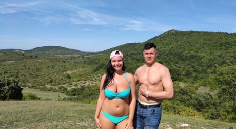 Chubby teen Sofia Lee frees her big natural tits from a bikini in the outdoors - pornpics.de