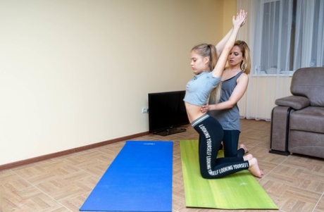 Blonde woman and her young stepdaughter have lesbian sex after doing yoga - pornpics.de