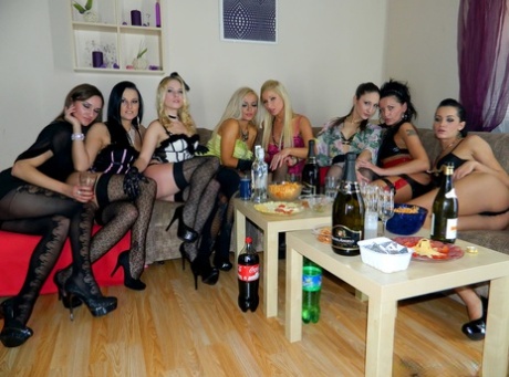 Lesbian pornstars engage in group sex during a sex toy party