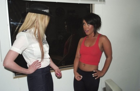 British policewomen give CFNM handjobs during a lineup at the station