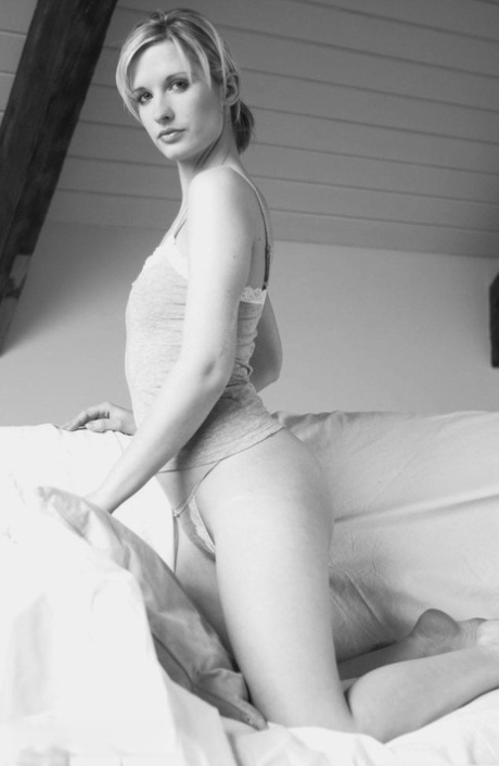Gorgeous blonde Leah strips to a thong during a solo engagement