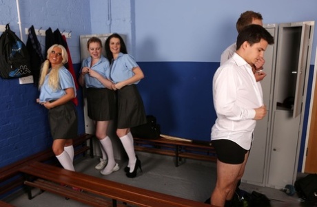 British schoolgirls give CFNM blowjobs in a male locker room