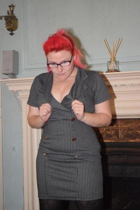 Thick middle-aged redhead strips to crotchless pantyhose during solo action