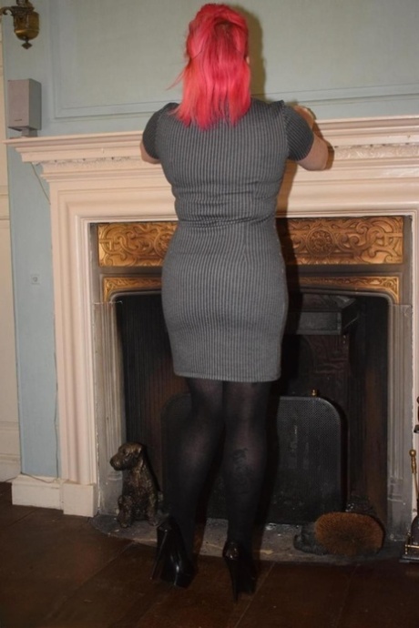 Thick middle-aged redhead strips to crotchless pantyhose during solo action