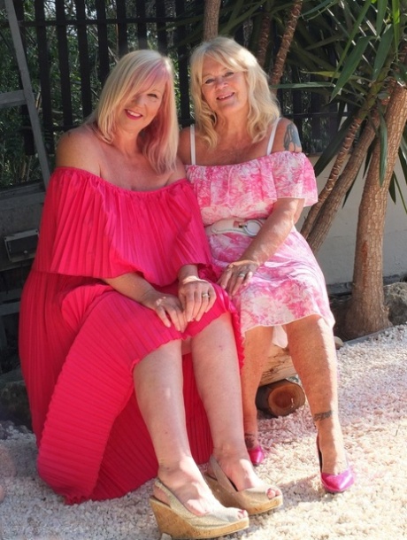 Older blonde pumpers Melody and Randy Raz flashed their panties while outdoors