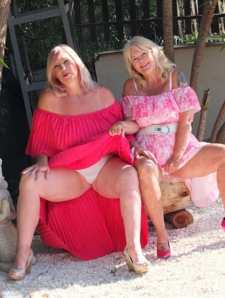 Older blonde pumpers Melody and Randy Raz flashed their panties while outdoors