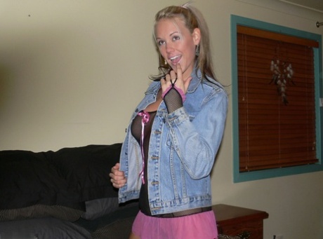 Sexy blonde Aussie Jewel takes off a denim jacket to get totally naked