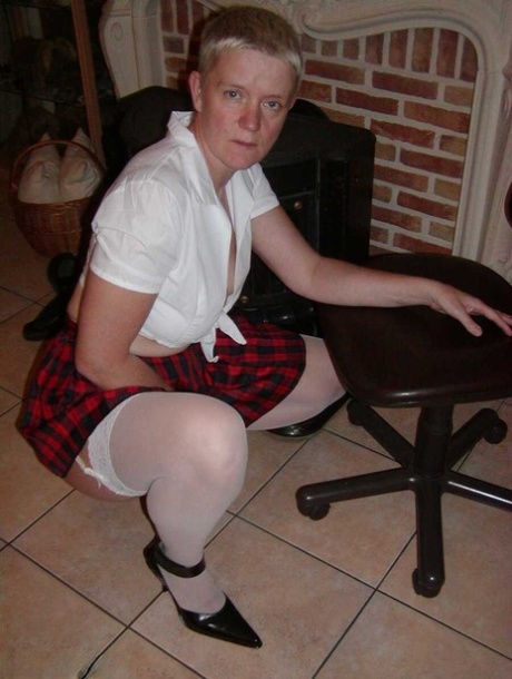 Old woman Tiffany Pearl partakes in upskirt play while dressed as a schoolgirl