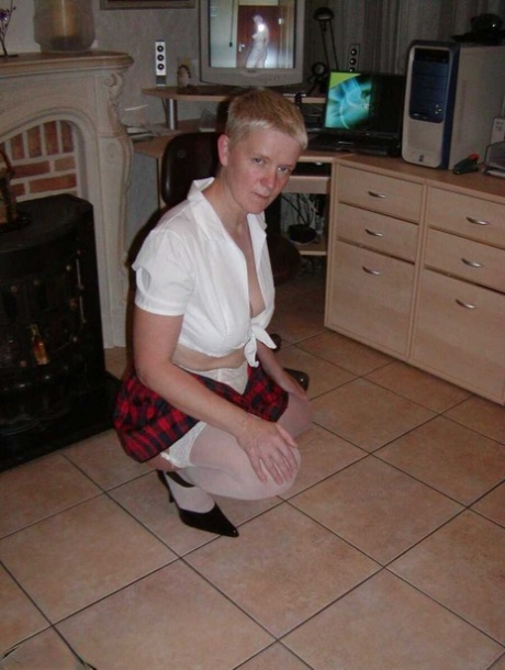 Old woman Tiffany Pearl partakes in upskirt play while dressed as a schoolgirl