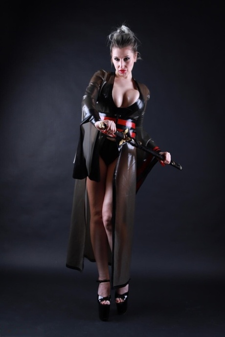 Platinum blonde model shows her great legs while outfitting cosplay apparel