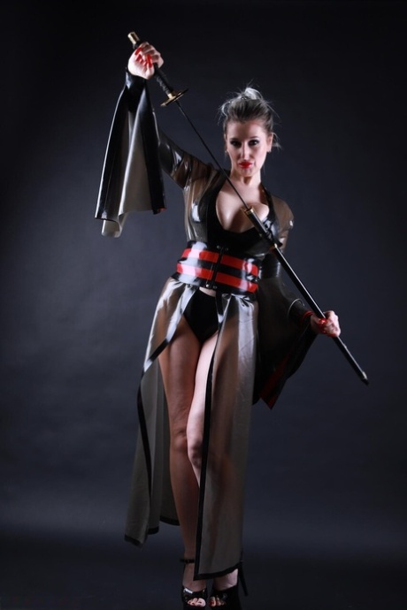 Platinum blonde model shows her great legs while outfitting cosplay apparel