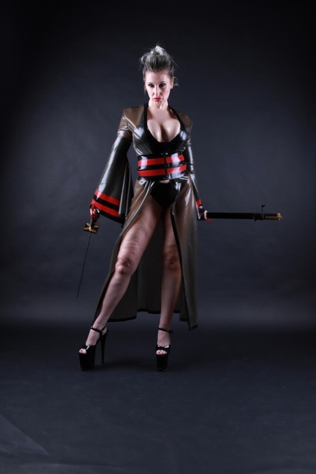 Platinum blonde model shows her great legs while outfitting cosplay apparel