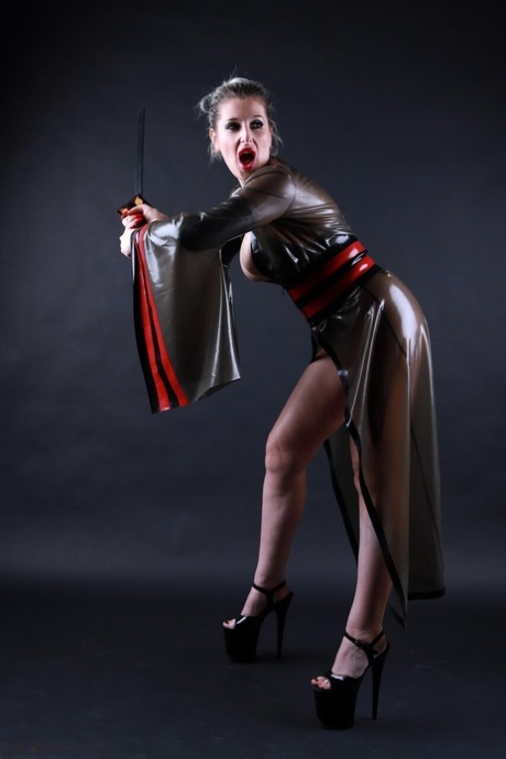 Platinum blonde model shows her great legs while outfitting cosplay apparel